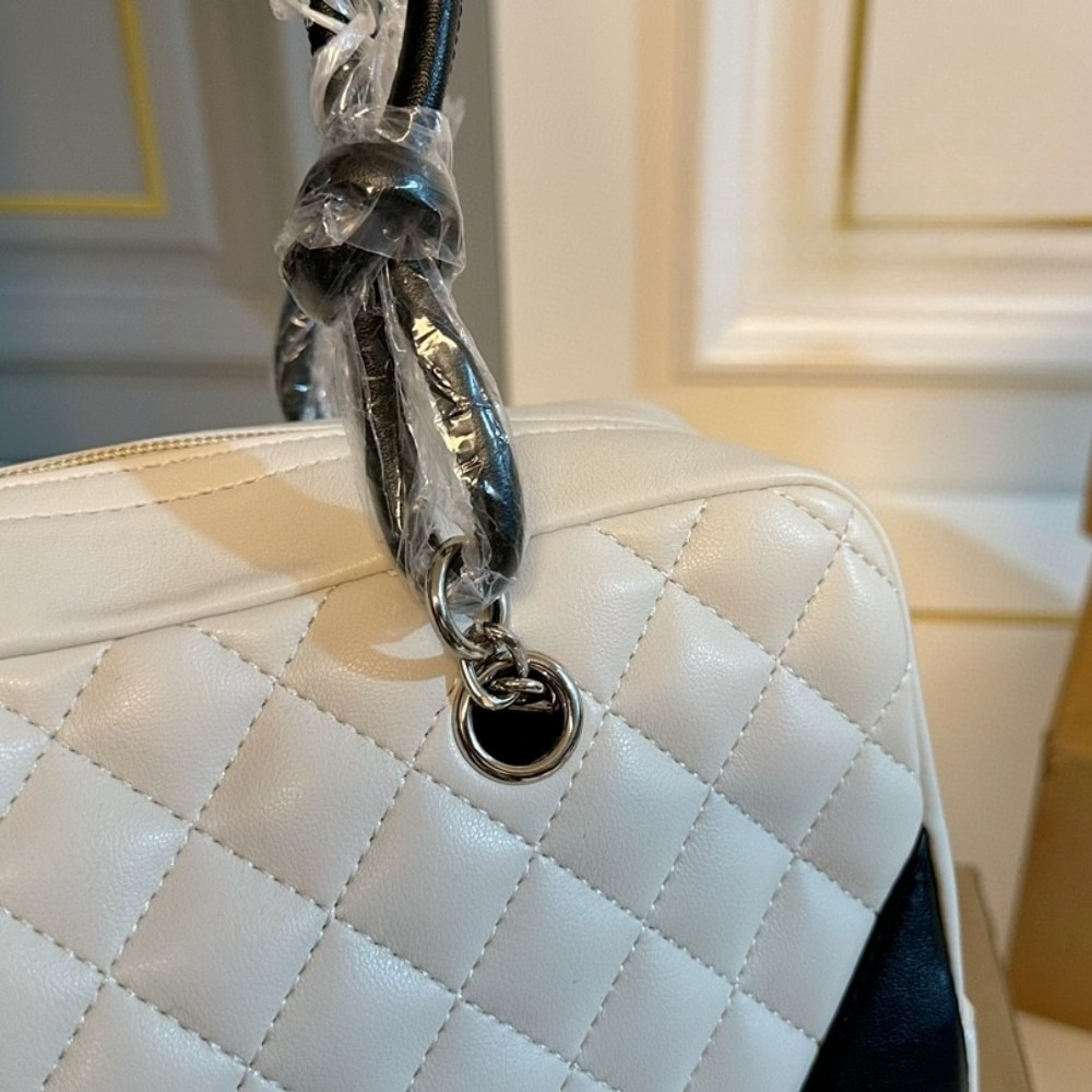 Chanel Cambon Bowler Bag Quilted Leather White And Black 26Cm