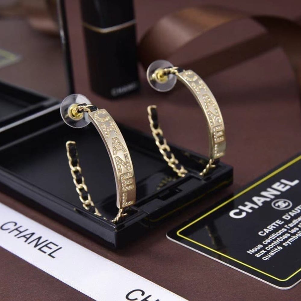 Chanel Strass Chain Hoop Earrings Gold Metal And Black Leather