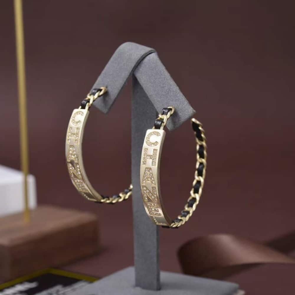 Chanel Strass Chain Hoop Earrings Gold Metal And Black Leather