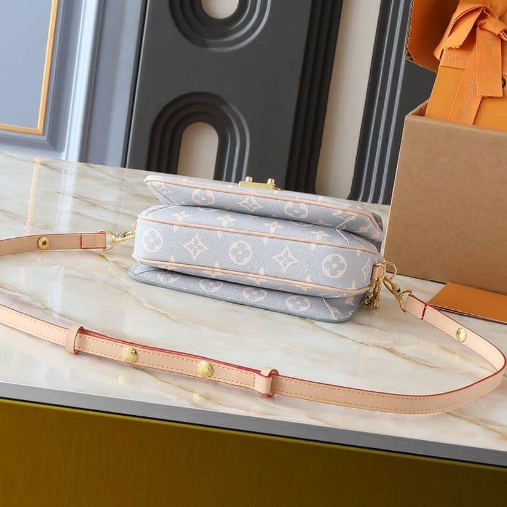 Louis Vuitton Pochette Métis East West Trianon Blue 21Cm M12429
